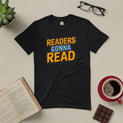 "Black Readers Gonna Read tee on table with open book, glasses, coffee, and chocolate bar"