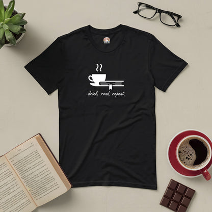 Black "Drink. Read. Repeat." tee with coffee cup and book stack design, perfect for book lovers and coffee enthusiasts.