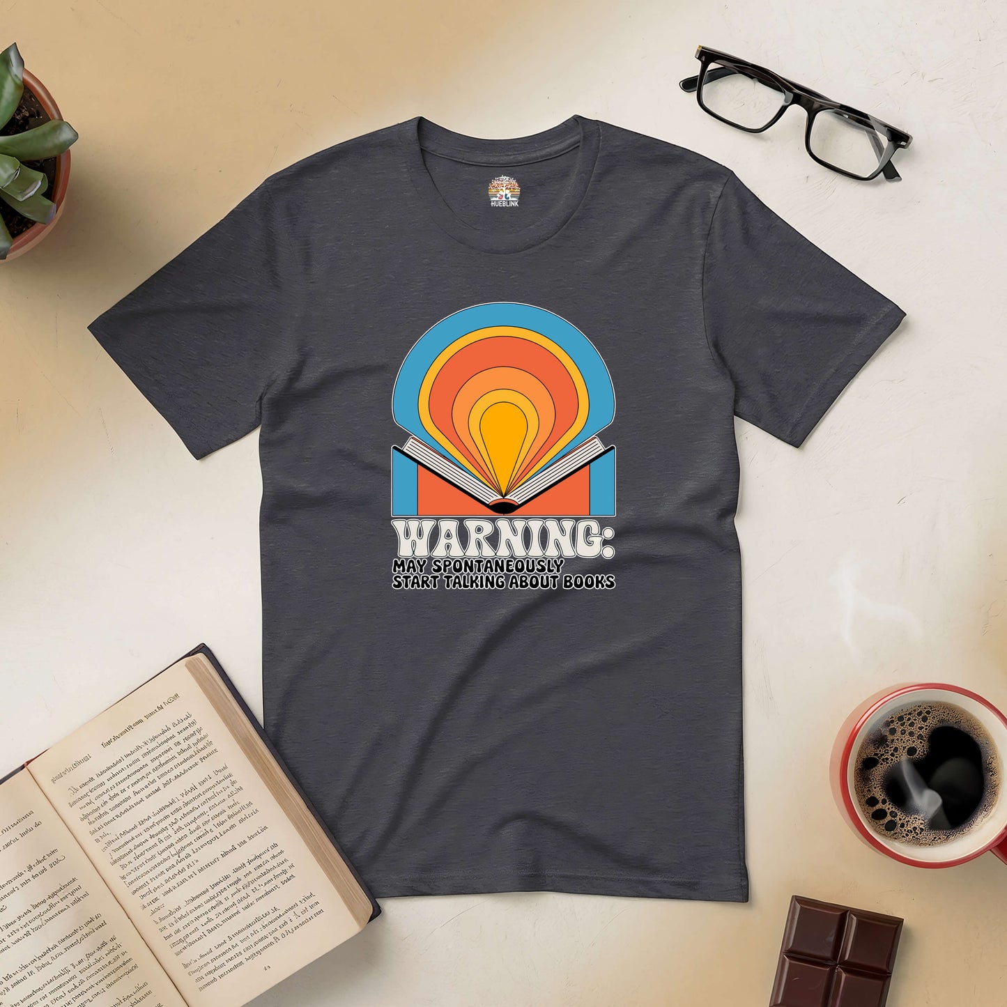 "Book lovers t-shirt with playful warning message and colorful design, perfect for bibliophiles who love discussing books"