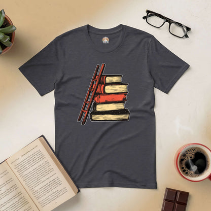 "Reaching New Heights Tee featuring stacked books and ladder design, symbolizing the journey of readers aiming higher with each story."