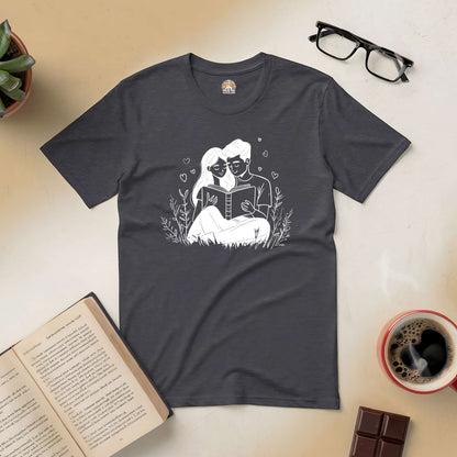 "Chapter of Us Tee featuring a romantic couple reading, ideal for book-loving pairs, surrounded by open books and coffee."