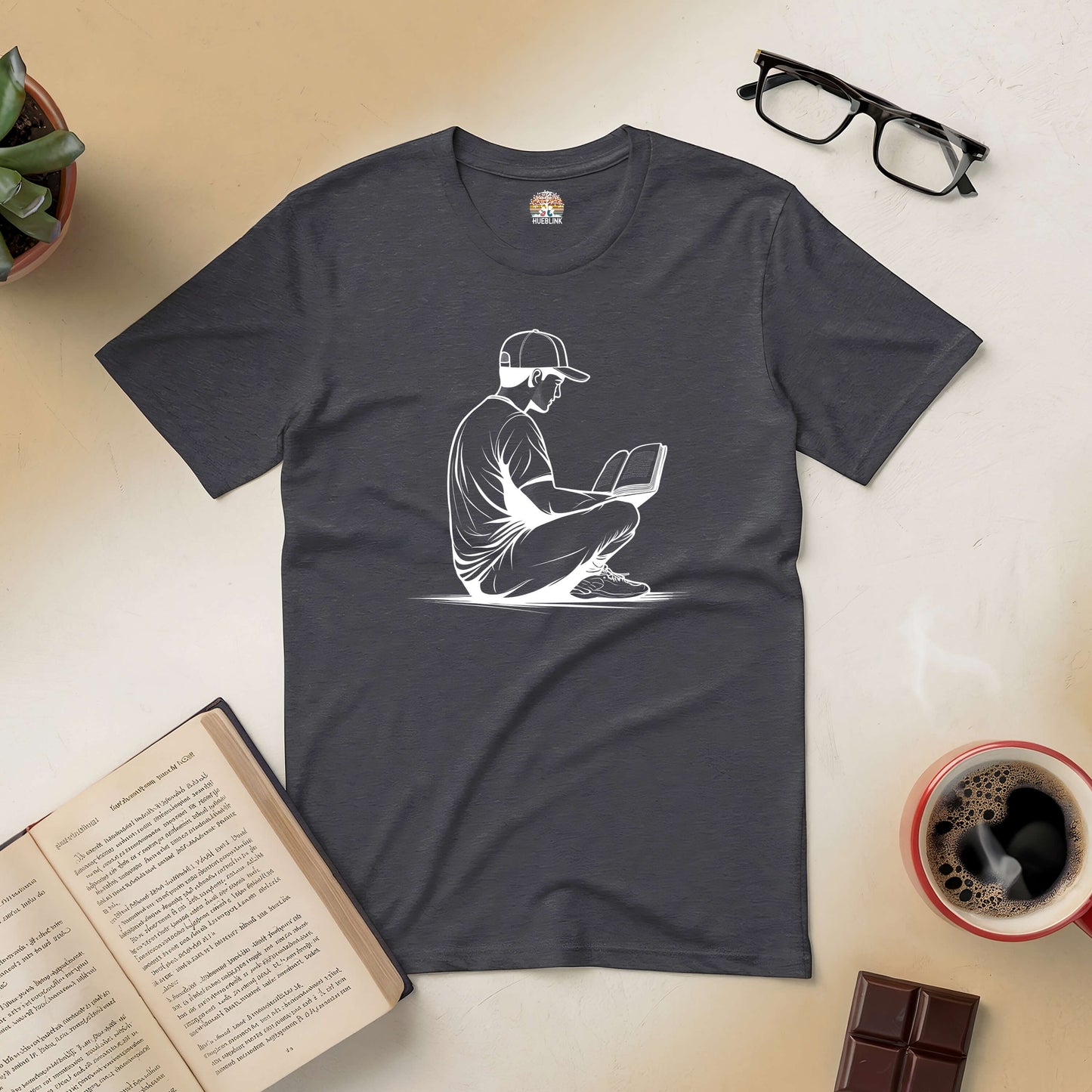 "Reading in Serenity Tee with book illustration, perfect for book lovers seeking calm and introspection."