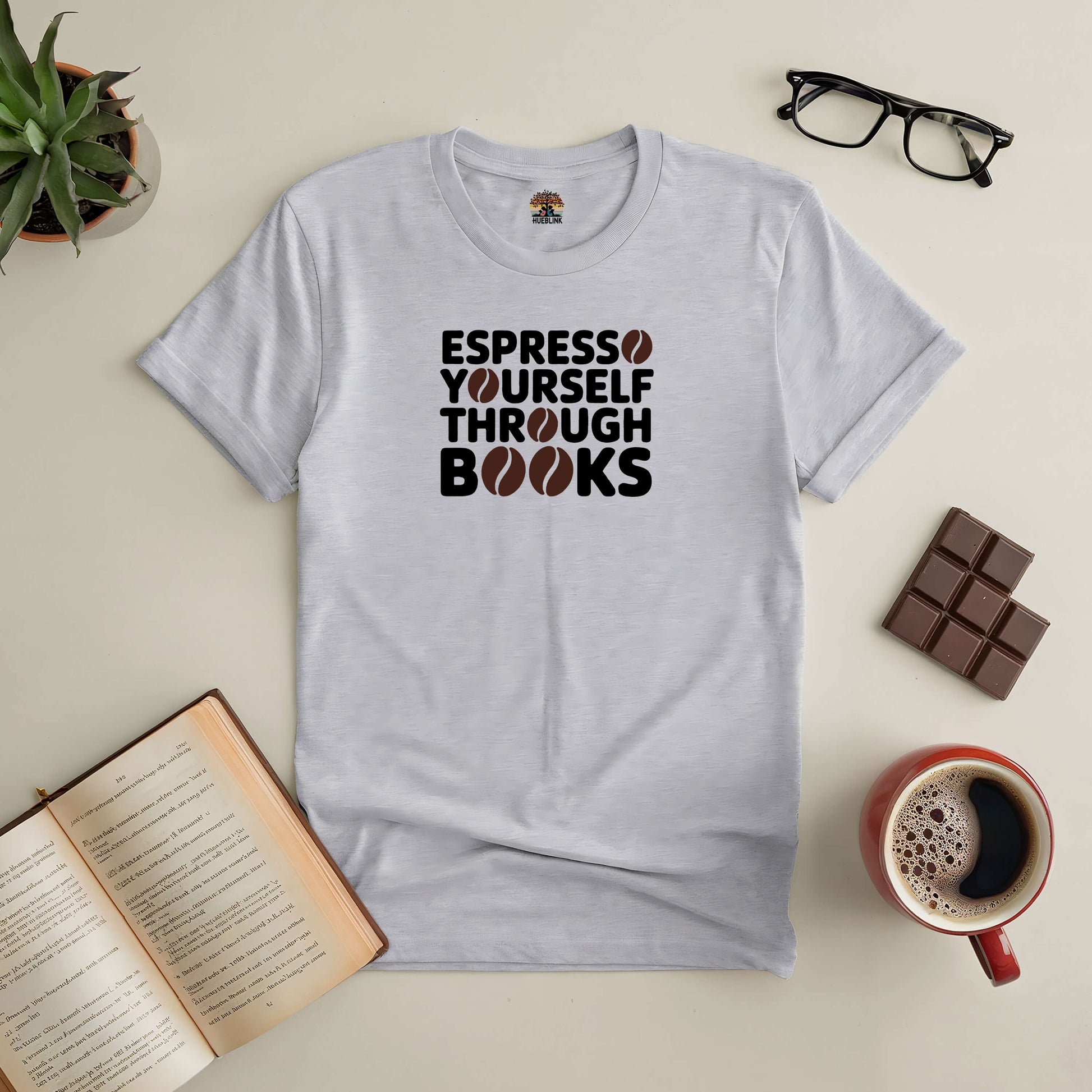 Espresso Yourself Through Books Tee with coffee and open book, perfect for coffee and book lovers.