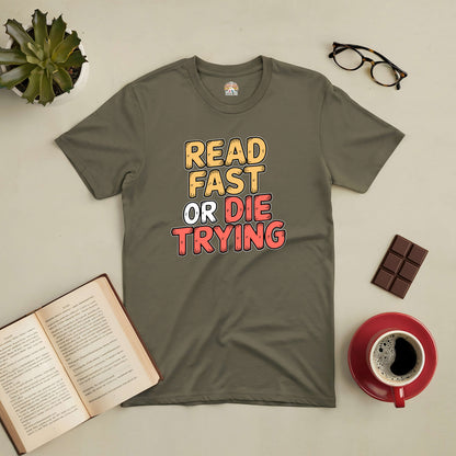 "Read Fast or Die Trying tee for book lovers, featuring bold text design, surrounded by open book, coffee cup, glasses, and chocolate."