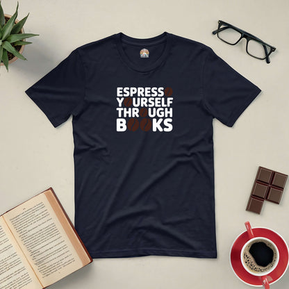 "Espresso Yourself Through Books Tee for coffee and book lovers laid flat with book, glasses, chocolate, and coffee cup"