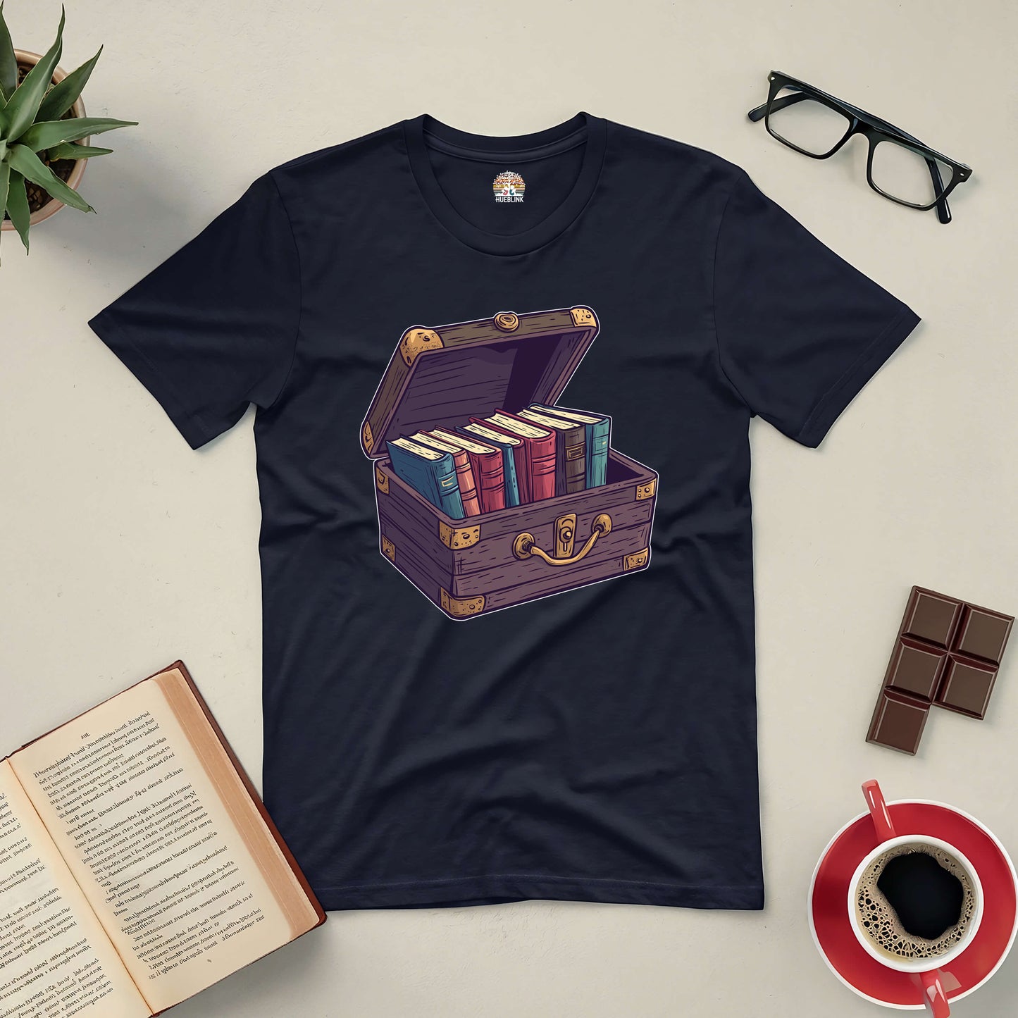 "Priceless Treasure Tee featuring a chest of books design, perfect for book lovers and literature enthusiasts."