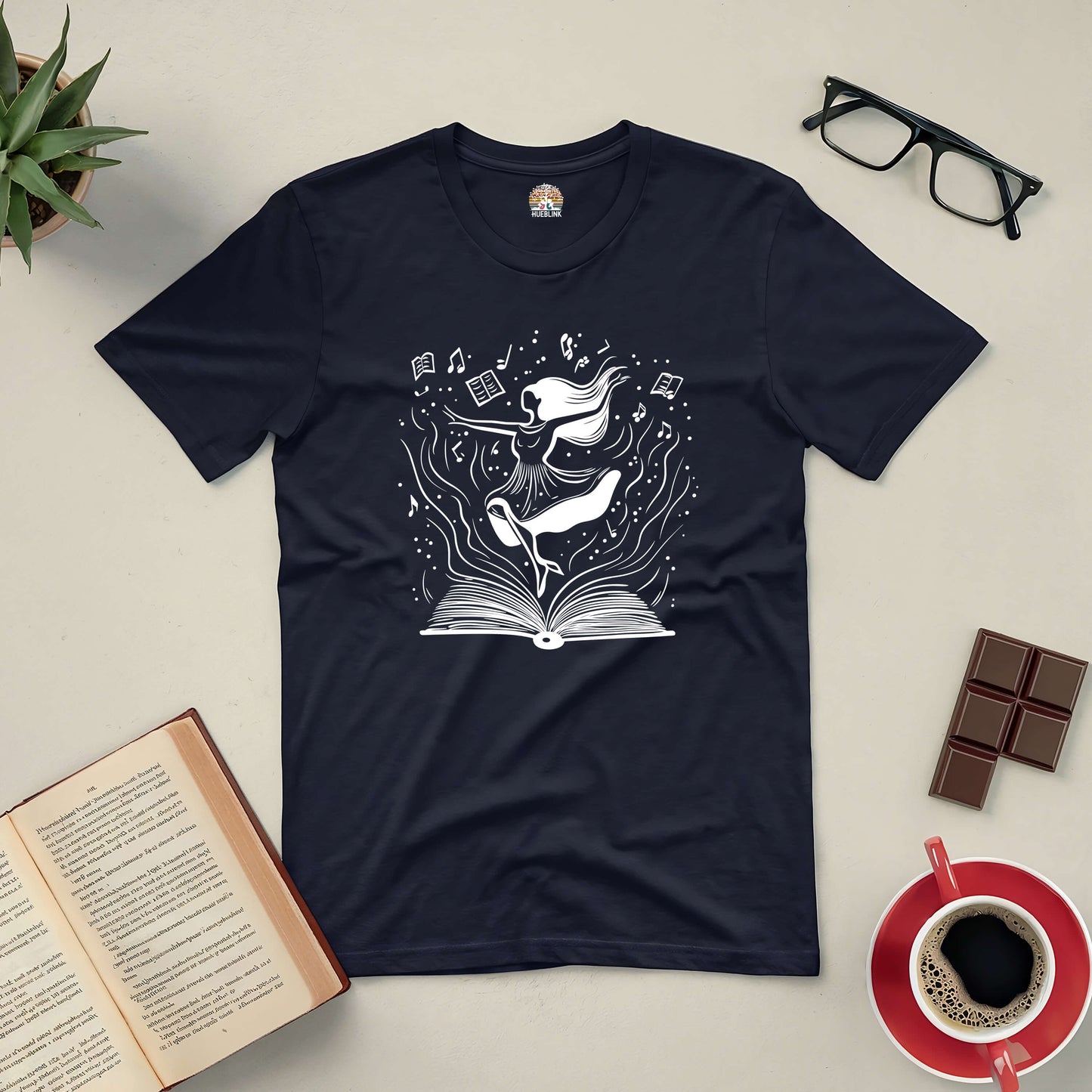 "Dance Through the Pages tee featuring artistic book and dancer design, perfect for storytelling and reading enthusiasts."