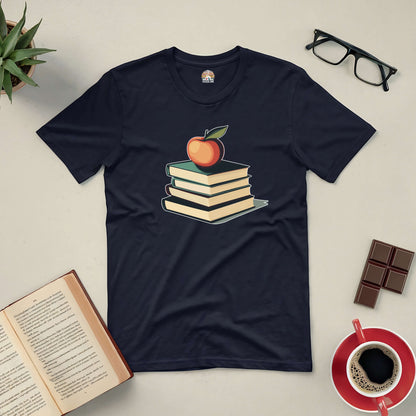 Black tee featuring stacked books with an apple graphic, ideal for book lovers and knowledge seekers.