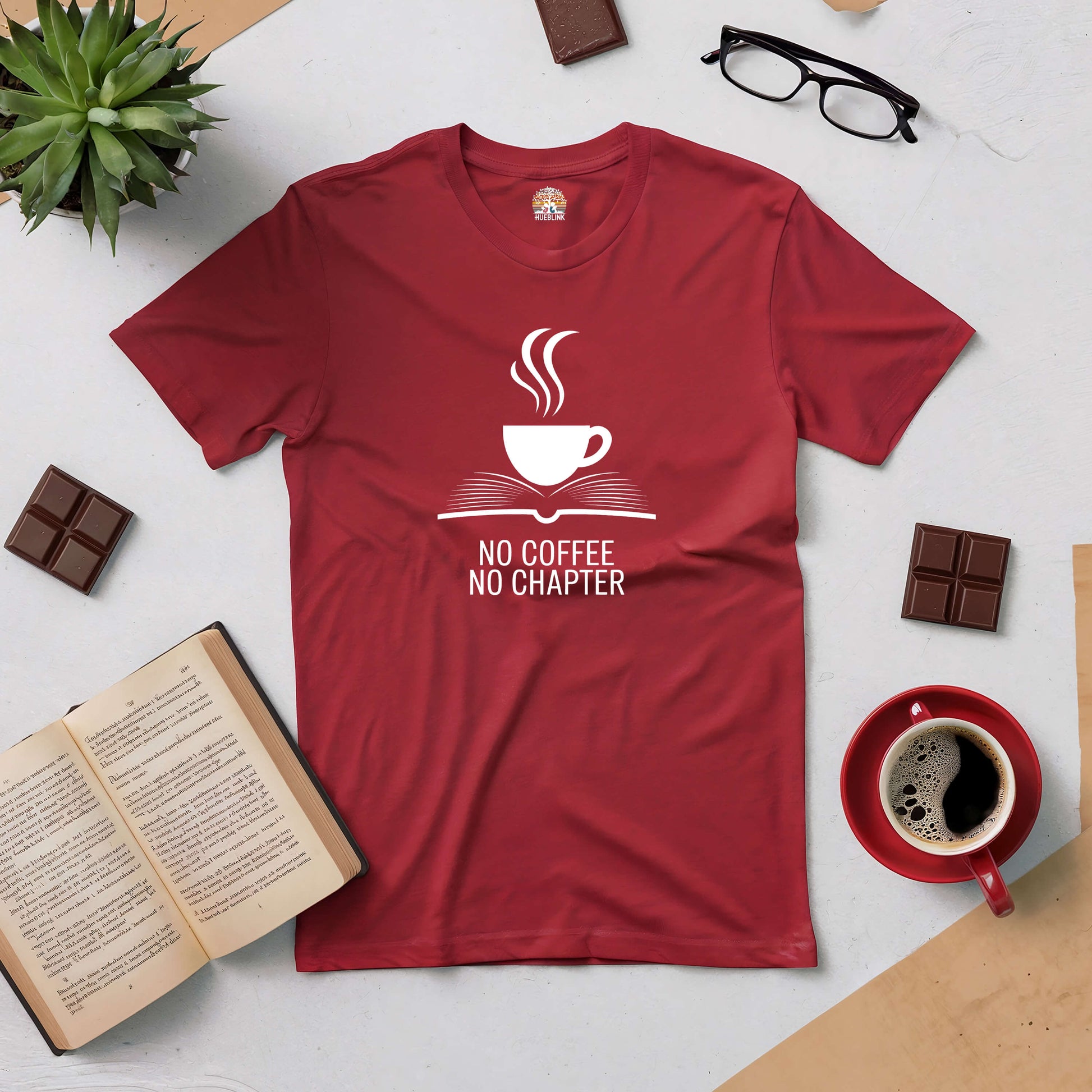 Red t-shirt with "No Coffee, No Chapter" design showing a steaming coffee cup and open book, perfect for book and coffee lovers.