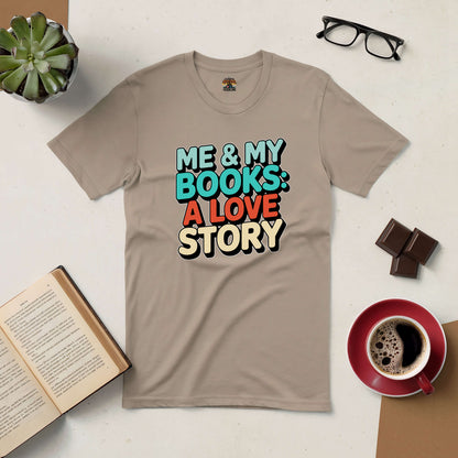 "Me & My Books: A Love Story Tee, perfect for book lovers, displayed with coffee, glasses, and a book on a white table"