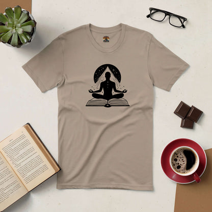 Gateway to Mindfulness Tee featuring a meditating figure on a book, surrounded by coffee, glasses, and chocolate.