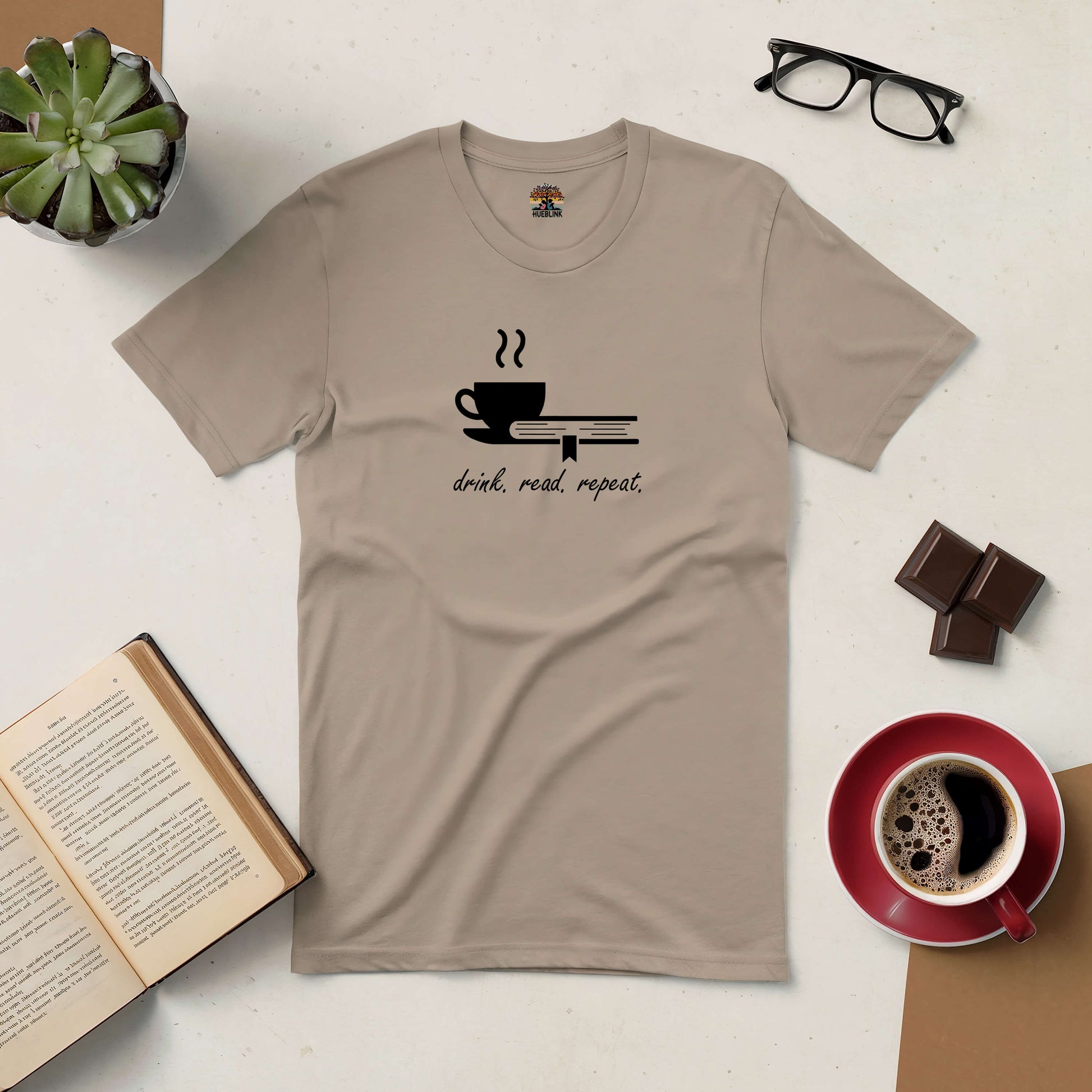 "Minimalist Drink. Read. Repeat. tee with coffee cup and book design, perfect for book lovers and coffee enthusiasts"