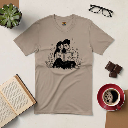 Beige "Chapter of Us" tee featuring a couple reading together, surrounded by books and coffee. Perfect for book-loving couples.