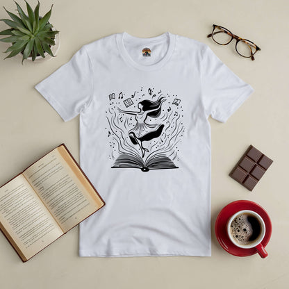 "Dance Through the Pages Tee with book and dancer design, perfect for book lovers. Flat lay with open book, coffee, and glasses."